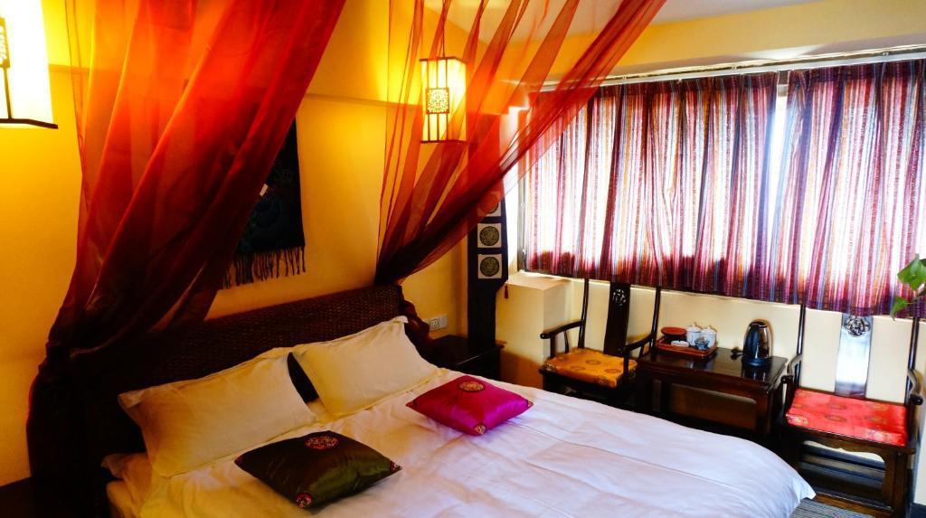Lijiang Wangjia Courtyard Inn Quarto foto