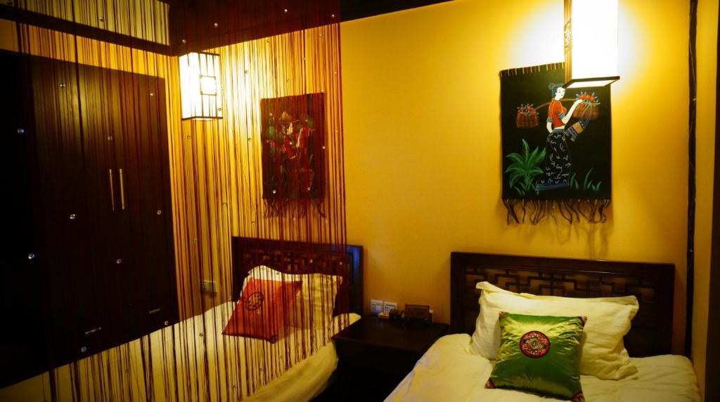 Lijiang Wangjia Courtyard Inn Quarto foto