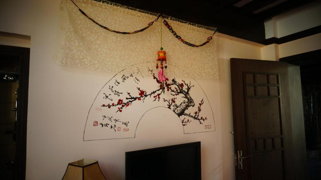 Lijiang Wangjia Courtyard Inn Quarto foto